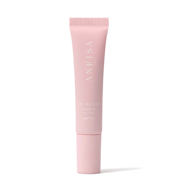 Pink skincare tube on a white background with a pink logo in the corner.
